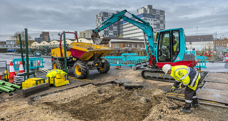 a construction site, likely involving roadworks or utility installation