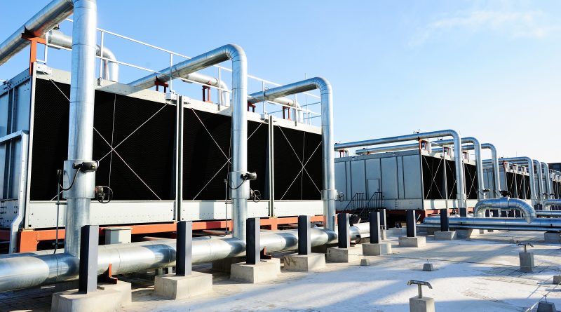 Sets of cooling towers in data center building